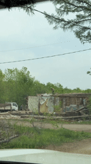 Man dismantles building remains in Birobidzhan, Russia