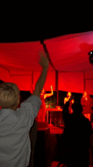 Live outdoor concert under lit canopy in Asureti, Georgia