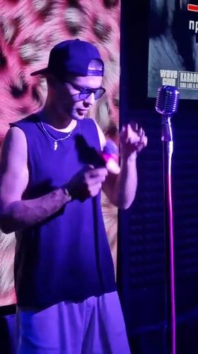 Karaoke session with multiple performers in Baan Bang Rak