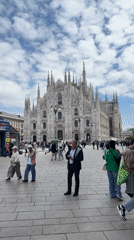 Morning crowds gather at Milan's Duomo square