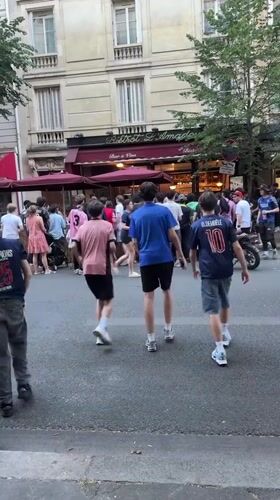 Soccer fans queue at Paris bistro