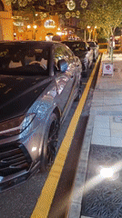 Luxury cars spotted on Doha street during evening hours