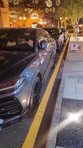 Luxury cars spotted on Doha street during evening hours