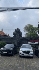 Drive through traditional Balinese village Sigaran captures local landmarks