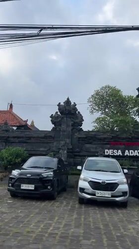 Drive through traditional Balinese village Sigaran captures local landmarks