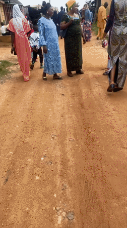 Community gathering in Rafin Par, Nigeria, traditional dress throughout
