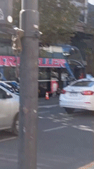 Busy street scene captured in Buenos Aires afternoon