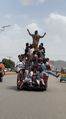 Overcrowded pickup truck carries twenty passengers in Bukuru, Nigeria
