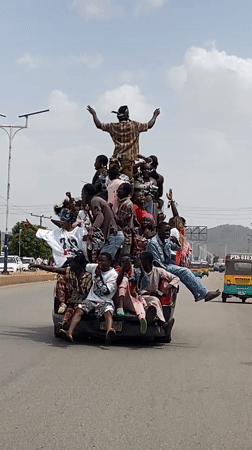 Overcrowded pickup truck carries twenty passengers in Bukuru, Nigeria