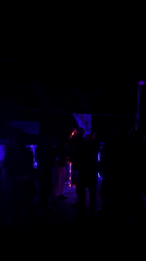 Outdoor party with colored lighting observed in Beit Uziel