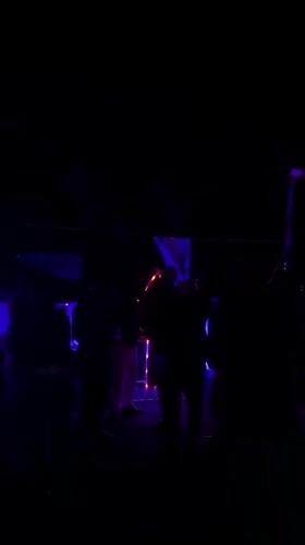 Outdoor party with colored lighting observed in Beit Uziel