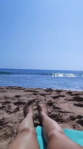 Lazy beach morning at El Campello, feet up, ocean ahead