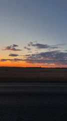 Sunset captured over rural road near Krasnaya, Russia