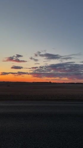 Sunset captured over rural road near Krasnaya, Russia