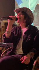 Female singer performs with band in Rafailovići, Montenegro