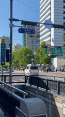 Ordinary street life captured across Seoul intersections