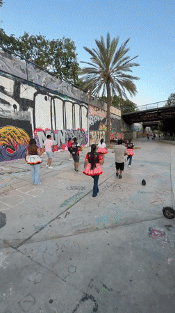 Young dancers practice routines in Barcelona's graffiti-covered streets