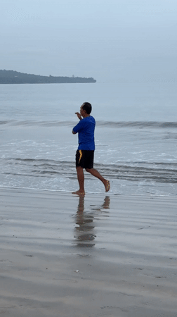 Evening beach activities documented along Indonesian coast