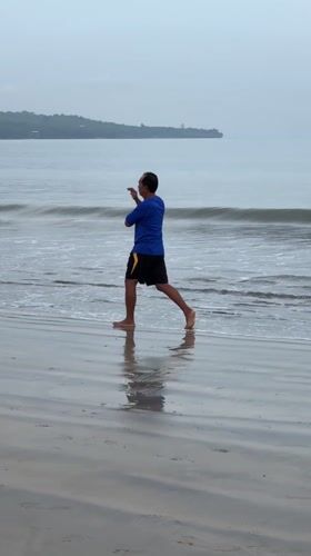 Evening beach activities documented along Indonesian coast