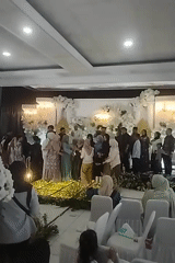 Wedding reception underway in Tangerang with full venue and catering setup