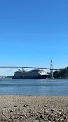Celebrity Solstice cruise ship transits Lions Gate Bridge Vancouver