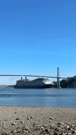 Celebrity Solstice cruise ship transits Lions Gate Bridge Vancouver