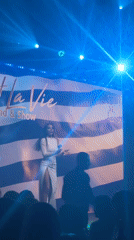 Woman performs on stage at C'est La Vie show in Sofia
