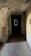 Person explores aged concrete bunker structure in Montenegro