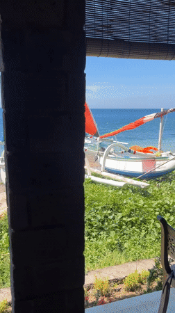 Traditional outrigger boats rest on Abang beaches, Indonesia