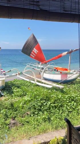 Traditional outrigger boats rest on Abang beaches, Indonesia