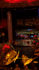 Sofia nightclub bustling with geometric lights and golden disco balls