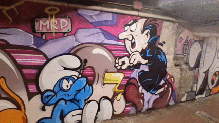 Cartoon character graffiti murals documented in Savona underpass
