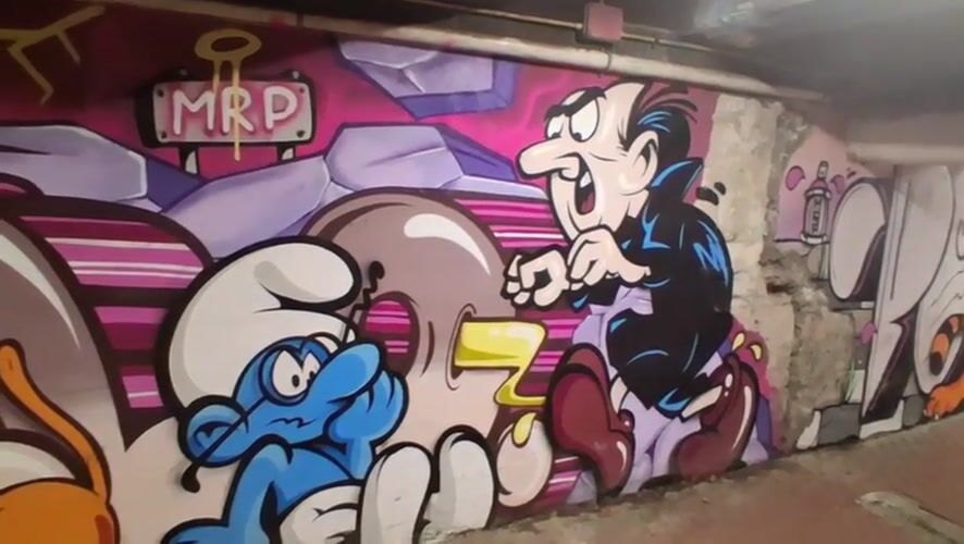 Cartoon character graffiti murals documented in Savona underpass