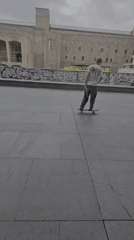 Skateboarder and decorated bike documented in Barcelona plaza gathering