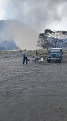 Couple with jeep observed near smoking mountain in Tosari