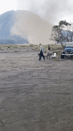 Couple with jeep observed near smoking mountain in Tosari