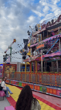 Carnival operates in Lille with thrill rides under cloudy skies