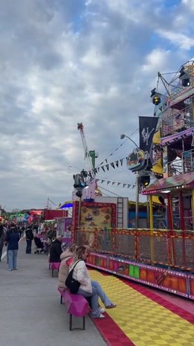 Carnival operates in Lille with thrill rides under cloudy skies