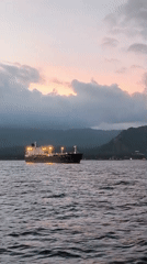 Cargo ship spotted in Indonesian waters at dusk
