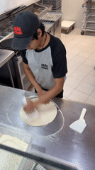 Papa John's serves evening customers in Tlaxcalancingo, Mexico