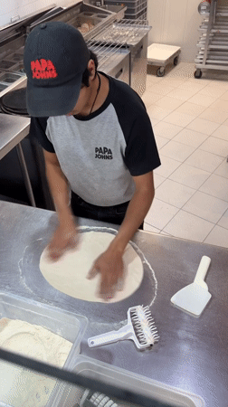 Papa John's serves evening customers in Tlaxcalancingo, Mexico