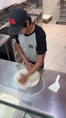 Papa John's serves evening customers in Tlaxcalancingo, Mexico