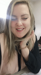 Woman observed at desk in Noviy, Russia
