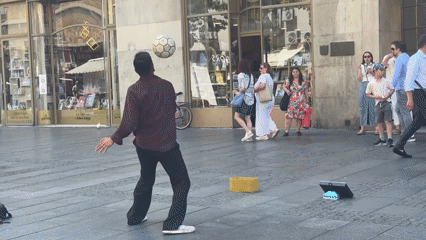 Street performers, book stalls, and café stops in central Belgrade