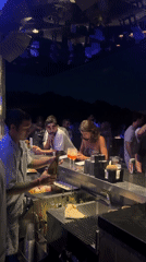 Kuta Selatan nightlife: bars, crowds, and an outdoor event.