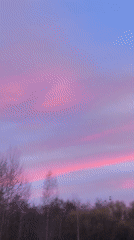 Witness documents sunset sequence over rural Belarus landscape