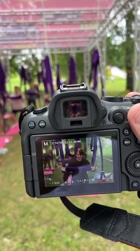 Aerial yoga class in a Minsk park, filmed outdoors
