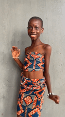 Young person dances joyfully in Badagry, Nigeria