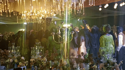 Wedding reception held in Jos, Nigeria with traditional attire