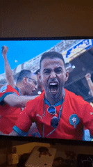 Brazil-Morocco soccer match watched on TV in Colorno